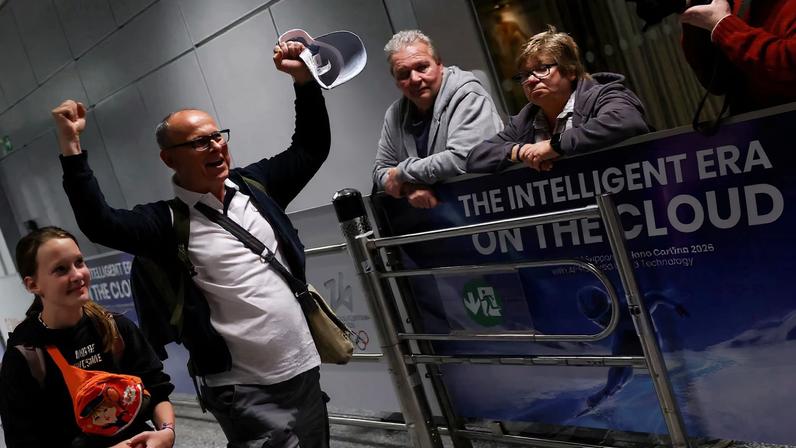 An unidentified passenger gestures following the evacuation from Dubai, amid the U.S.-Israeli conflict with Iran, at the airport in Frankfurt, Germany, March 3, 2026. REUTERS/Kai Pfaffenbach