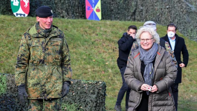 General Christian Freuding welcomes German Defence Minister Christine Lambrecht during her visit at the Munster military base, in Munster, Germany, February 7, 2022.