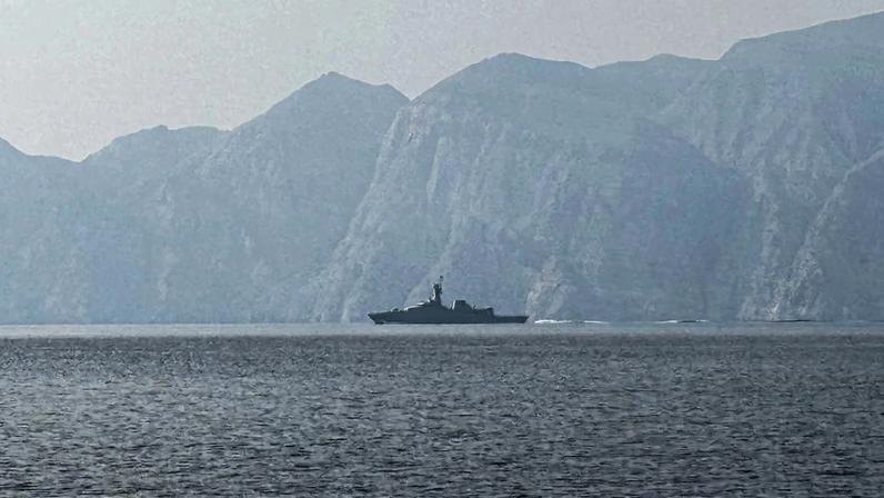 A navy vessel is seen sailing in the Strait of Hormuz.