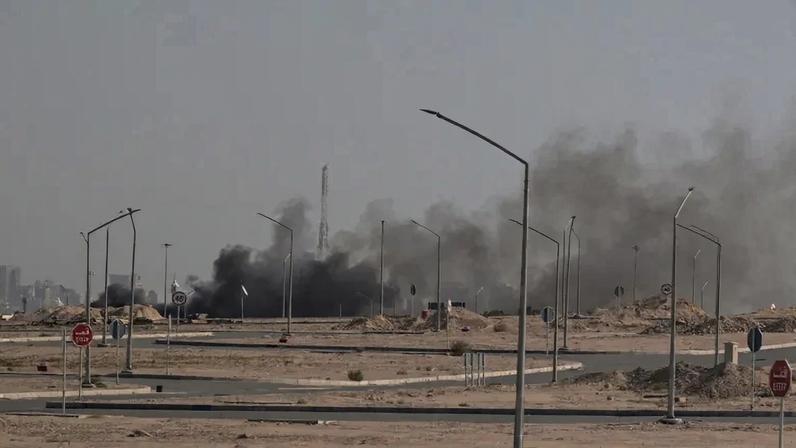 Smoke rises from a reported Iranian strike in the area where the U.S. Embassy in Kuwait City is located.