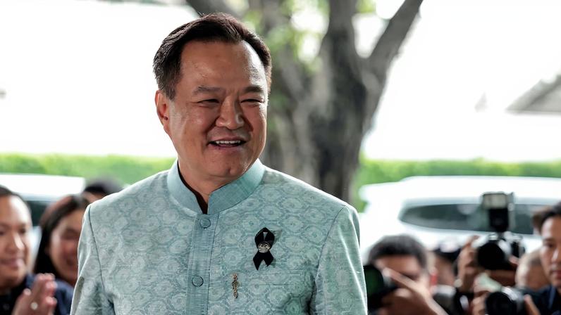 Anutin Charnvirakul, Thailand's caretaker Prime Minister, Bhumjaithai Party leader and prime ministerial candidate, reacts upon arrival ahead of a meeting with party members at Bhumjaithai...
