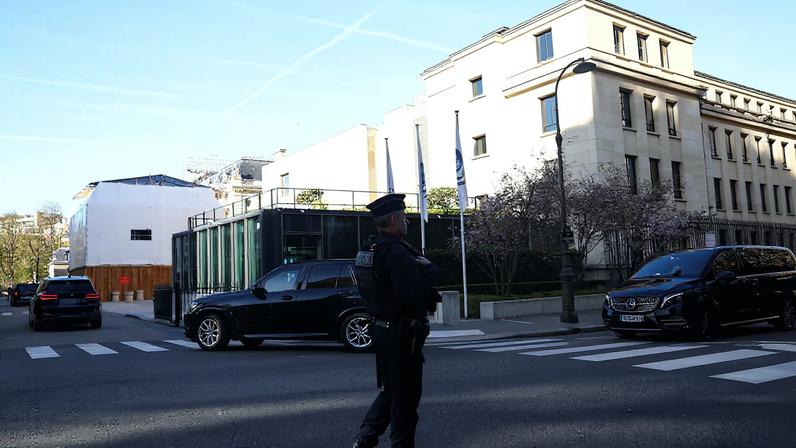 A U.S. delegation arrives at the Organisation for Economic Co-operation and Development (OECD) headquarters for trade talks with a Chinese delegation, in Paris, France, March 15, 2026.