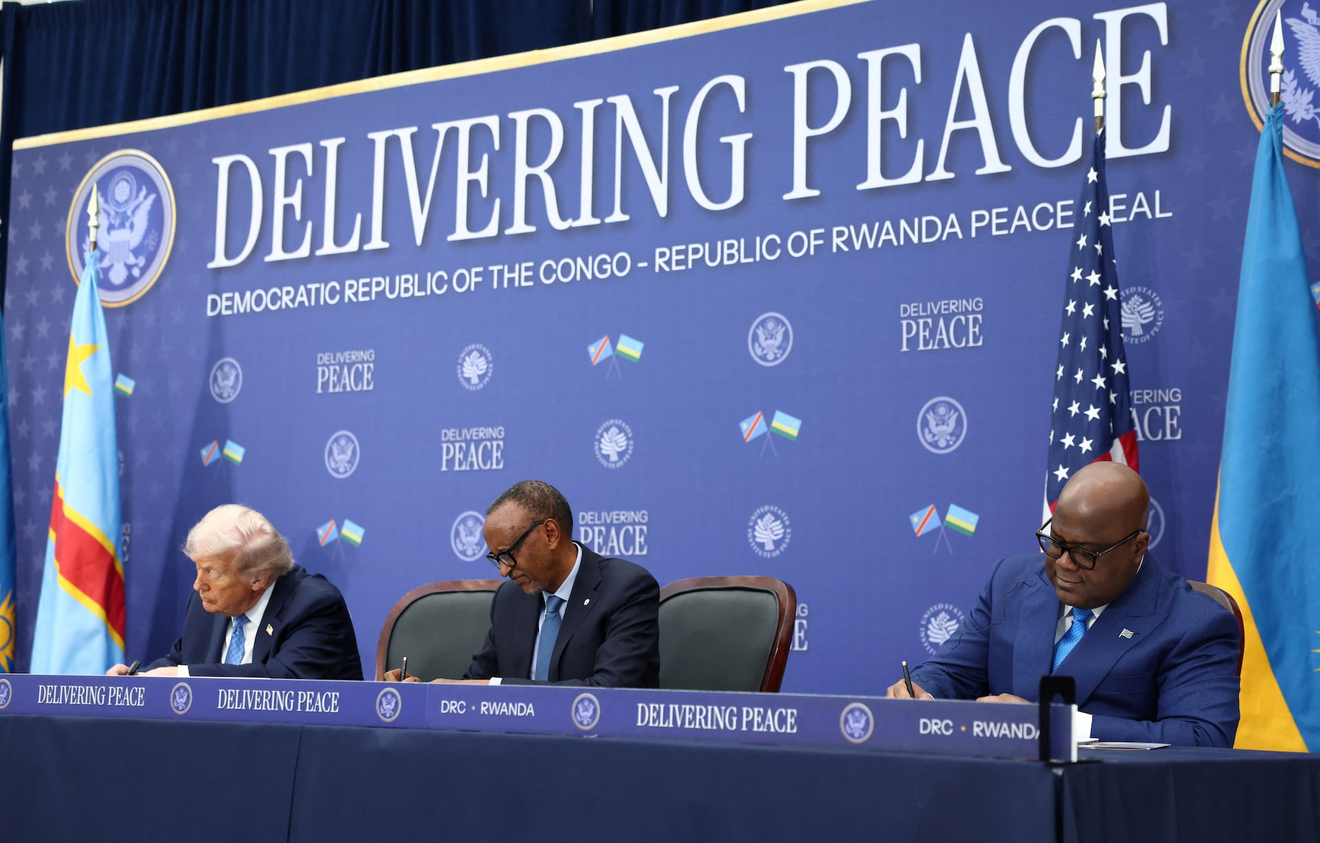 U.S. President Donald Trump, President of the Democratic Republic of the Congo Felix Tshisekedi and President of Rwanda Paul Kagame take part in a signing ceremony at the U.S. Institute of Peace in Washington, D.C., U.S., December 4, 2025. REUTERS/Kevin Lamarque/File Photo