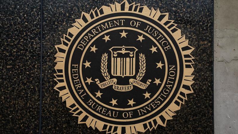 The logo of the Federal Bureau of Investigation (FBI) displayed on the building in Washington, D.C., U.S., November 28, 2025. REUTERS/Nathan Howard