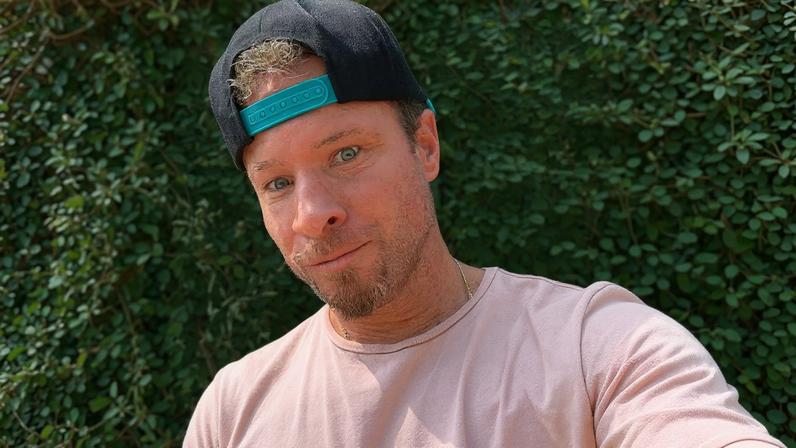 Brian Littrell (above in May 2025) claimed in a new interview that he, his wife, and son are receiving threats over the beachfront property feud.