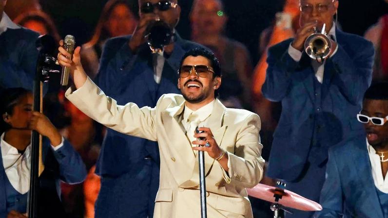 Bad Bunny performs during his "Debi tirar mas fotos" world tour at the MAS Monumental Stadium in Buenos Aires on February 13, 2026. (Photo by Luis ROBAYO / AFP via Getty Images)
