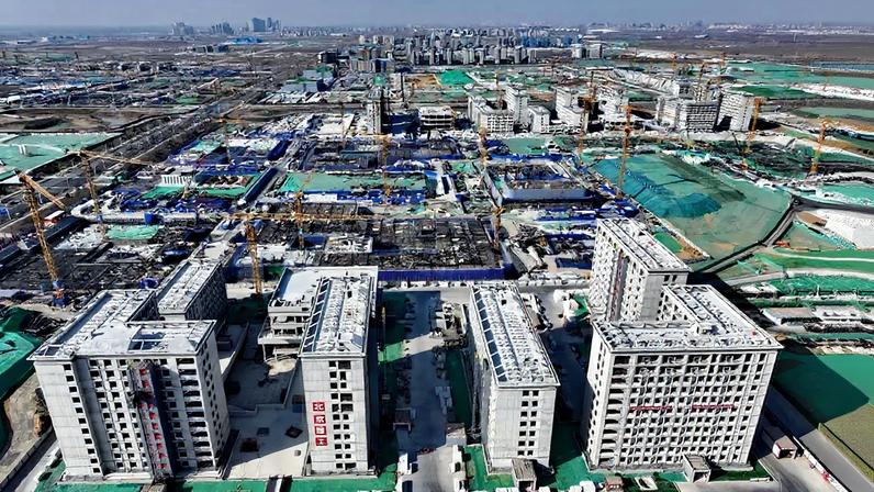 An aerial drone photo shows new university campuses under construction in Xiong’an New Area, northern China’s Hebei province, on Feb. 11.