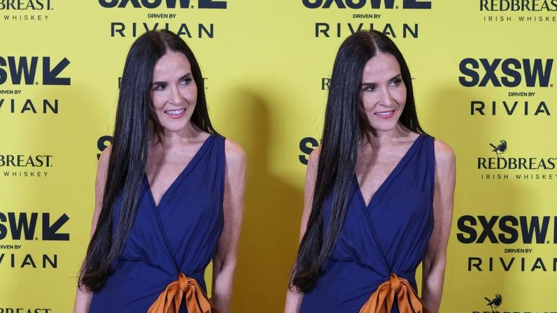 Demi Moore showed off her legs for days in a Saint Laurent dress featuring a hip-high slit at the SXSW premiere of “I Love Boosters.”