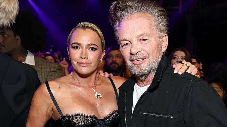 Teddi Mellencamp honored her father, John Mellencamp, who was given the Icon Award at Thursday's iHeartRadio Music Awards in Los Angeles. They're seen together here.