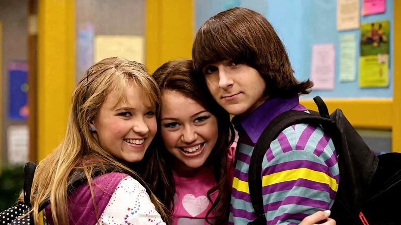 Emily Osment and Mitchel Musso (seen above with Miley Cyrus) skipped the “Hannah Montana 20th Anniversary Special” premiere Monday night.