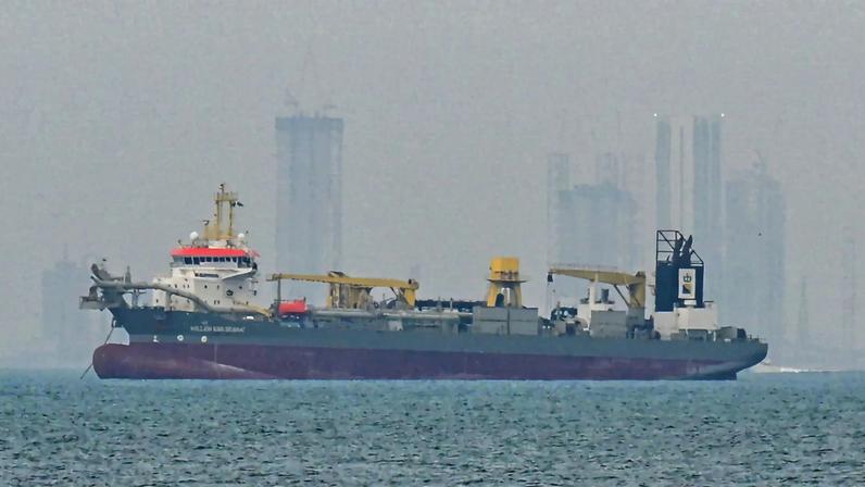 Commercial vessels anchored off UAE coast near Strait of Hormuz