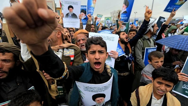 Houthi supporters shout slogans and hold portraits of Iran's slain supreme leader Ayatollah Ali Khamenei during a rally in solidarity with Iran and Lebanon, amid the U.S.-Israeli conflict with Iran, in Sanaa, Yemen, on March 6.
