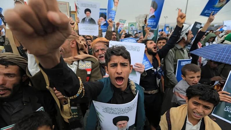 Houthi supporters shout slogans and hold portraits of Iran's slain supreme leader Ayatollah Ali Khamenei during a rally in solidarity with Iran and Lebanon, amid the U.S.-Israeli conflict with Iran, in Sanaa, Yemen, on March 6.