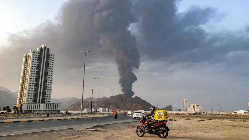 A tall smoke plume billows following an explosion in the United Arab Emirates on March 3, 2026.