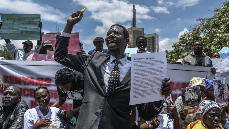 Families of Kenyans recruited illegally to fight for the Russian army in the Russia-Ukraine war hold photos of their missing relatives on March 05, 2026.