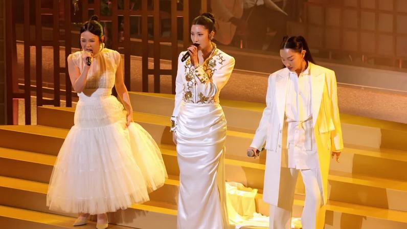(L-R) Rei Ami, EJAE, and Audrey Nuna perform onstage during the 98th Oscars at Dolby Theatre on March 15, 2026 in Hollywood, California.