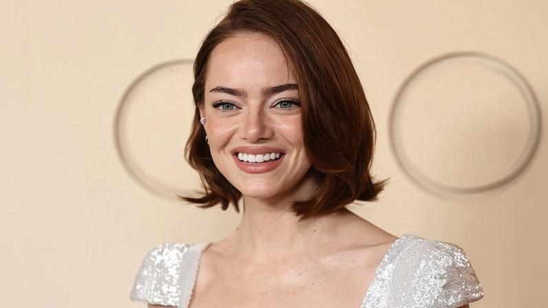 Emma Stone hit the Oscars 2026 red carpet in an ethereal Louis Vuitton gown.
