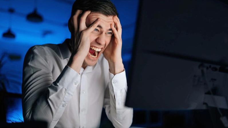 Man Screaming At PC