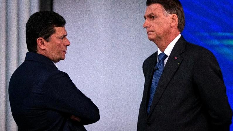 Sergio Moro e o presidente Jair Bolsonaro antes do debate da TV Globo