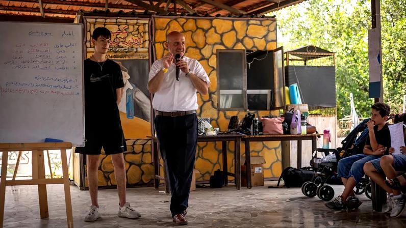 Pastor Mazen Hamate during a back-to-school event that his church hosted for Syrian children in September 2025.