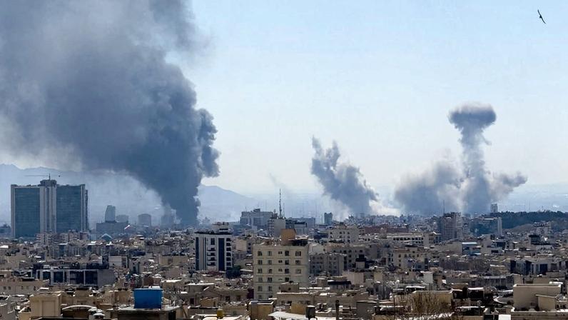 Plumes of smoke rise following reported explosions in Tehran, Iran, on March 1.