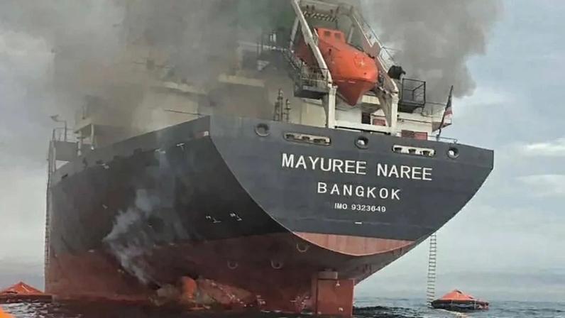 This handout photo released by the Royal Thai Navy shows smoke rising from the Thai bulk carrier Mayuree Naree near the Strait of Hormuz after an attack on March 11.