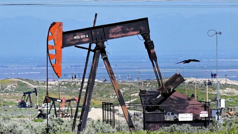Oil pumpjacks work the Midway-Sunset Field in Kern County outside of McKittrick, California on March 8.