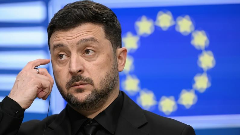 Ukrainian President Volodymyr Zelensky takes part in a press conference after a meeting of European leaders in Brussels on Dec. 18, 2025.