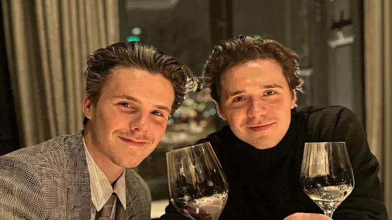 Cruz Beckham’s unreleased song “Loneliest Boy” appears to take shots at his brother, Brooklyn Beckham, amid their ongoing family feud. The siblings are pictured here during happier times in March 2023.