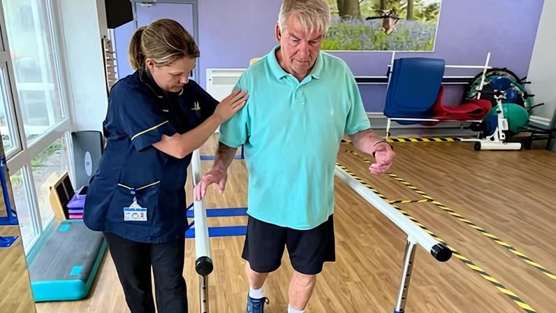David Stadelman, a stroke survivor from Bournemouth, Dorset, gets therapy from Alahna Cullen.