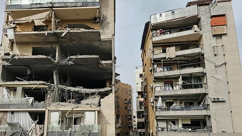 Damaged buildings after an overnight Israeli airstrike in the Al Hadath neighbourhood of Beirut's southern suburbs on 1 April 2026.