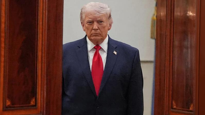 U.S. President Donald Trump arrives to address the nation from the Cross Hall of the White House in Washington on April 1.