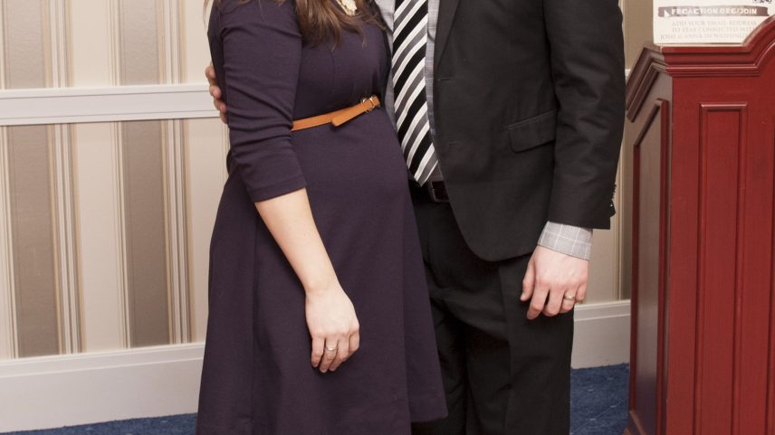Anna and Josh Duggar pose together, with Anna visibly pregnant.