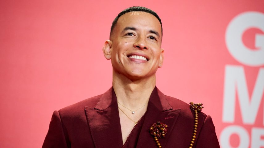 Daddy Yankee in red suit
