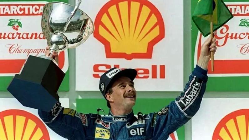Nigel Mansell em vitória na F1 (Foto: ANTONIO SCORZA / AFP)