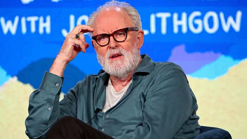 John Lithgow said JK Rowling’s trans views have been “twisted and misrepresented.”