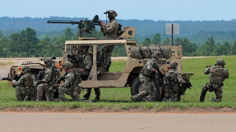 U.S. Army Special Operations soldiers perform a demonstration for U.S. President Donald Trump and other military and civilian leaders in Fort Bragg, North Carolina, on June 10, 2025.