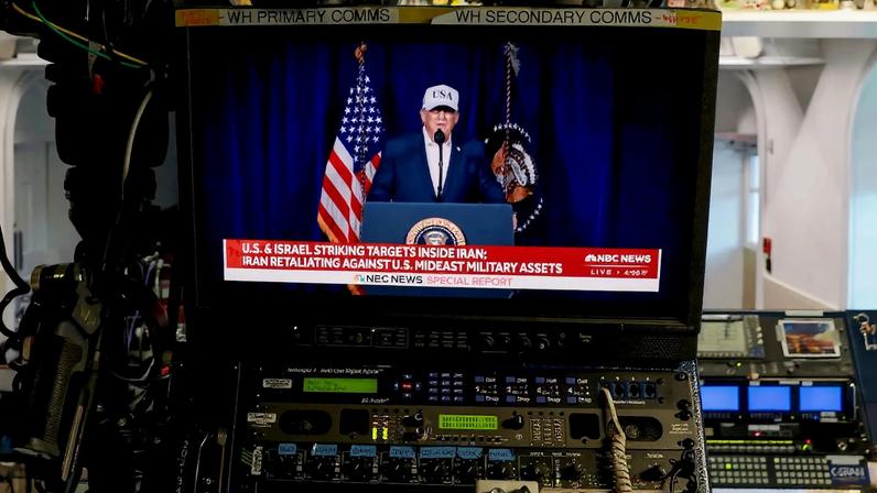 An NBC live feed airs a clip of an announcement from U.S. President Donald Trump.