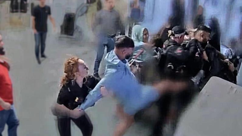 CCTV footage showing the incident at Manchester airport in July 2024.