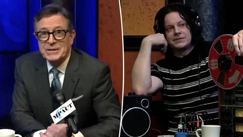 Stephen Colbert smiles while seated on a television set for "Only In Monroe" with three empty chairs for guests.