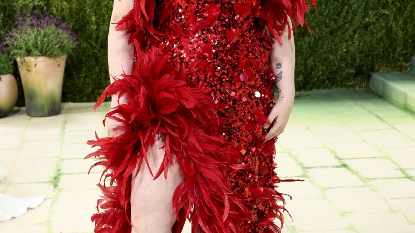 Lena Dunham arrived at the Met Gala in a showgirl-inspired dress.