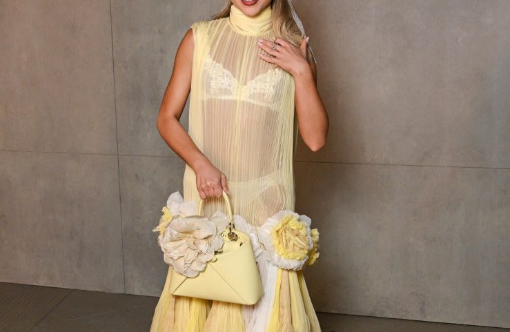 Sabrina Carpenter arrived at the Dior cruise 2027 show wearing a butter yellow dress.