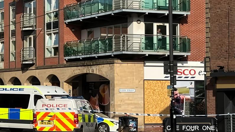 A police cordon at the scene outside the One Four One bar on West Street, Sheffield, where a 30-year-old woman died after a shooting.