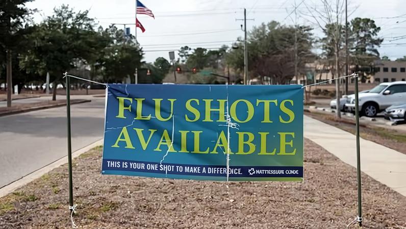 A banner encouraging flu vaccines remains outside the Hattiesburg Clinic in Hattiesburg, Mississippi, on 10 February 2026.