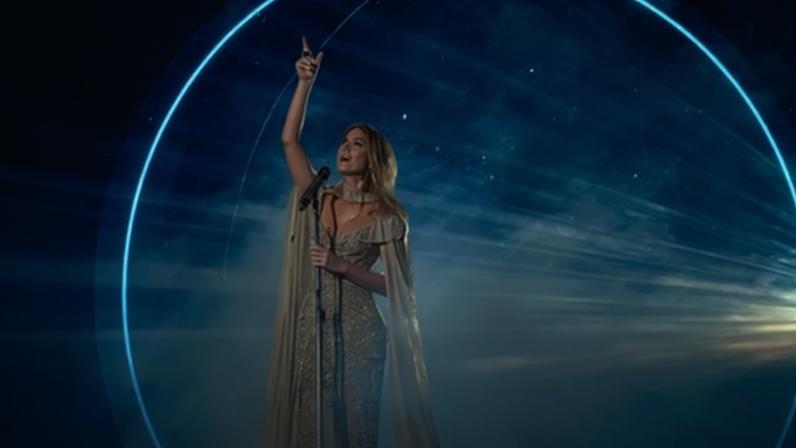 Delta Goodrem signs at Eurovision in Vienna.
