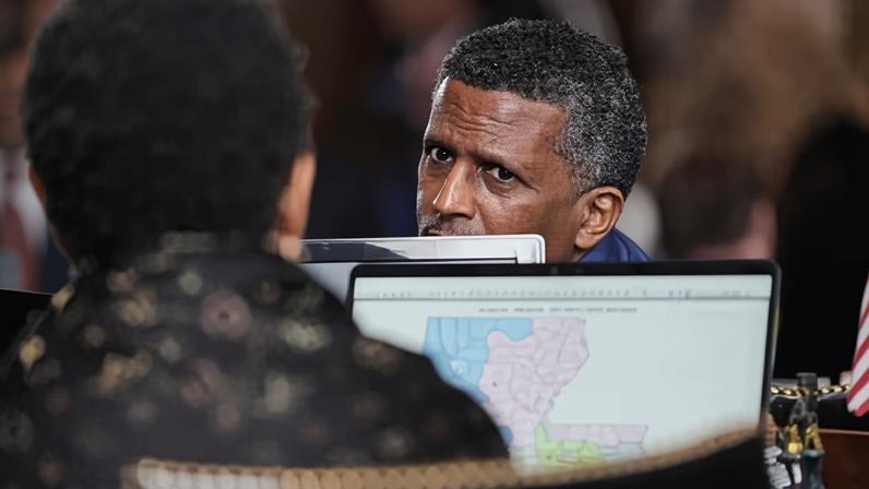 Edmond Jordan, a Democratic Louisiana state representative, talks with fellow lawmakers prior to a Louisiana house vote on a redistricting plan to eliminate a majority-Black congressional district in Baton Rouge, Louisiana, on 21 May 2026.