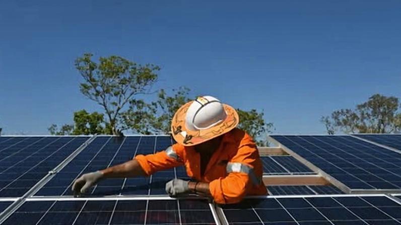 Renewable energy and batteries are helping bring down power bills, the government says.