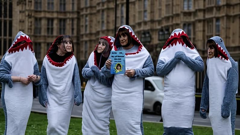 Students outside the Houses of Parliament campaign for student loan reform in February.