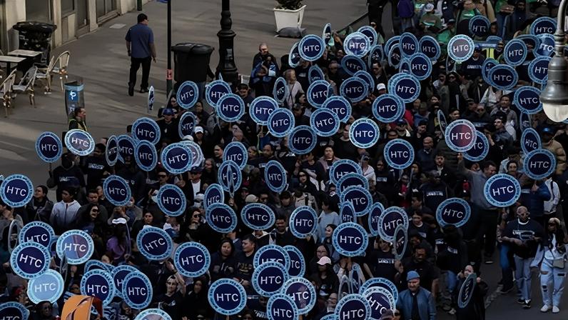 People holding Hotel and Gaming Trades Council signs participate in an International Workers’ Day demonstration at Washington Square Park in Manhattan, New York City, on 1 May 2026.