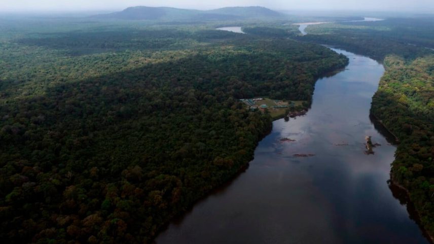 The Essequibo River flows through Kurupukari crossing in Guyana, Nov. 19, 2023. Image by Juan Pablo Arraez via Associated Press.